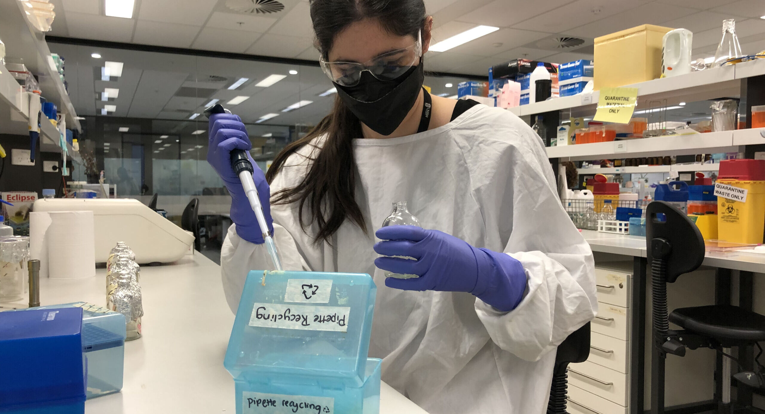 This image shows a laboratory technician at the University of NSW as part of the LEAF program